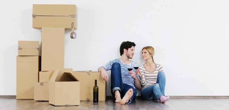 bigstock-happy-Young-couple-moving-in-n-33265883